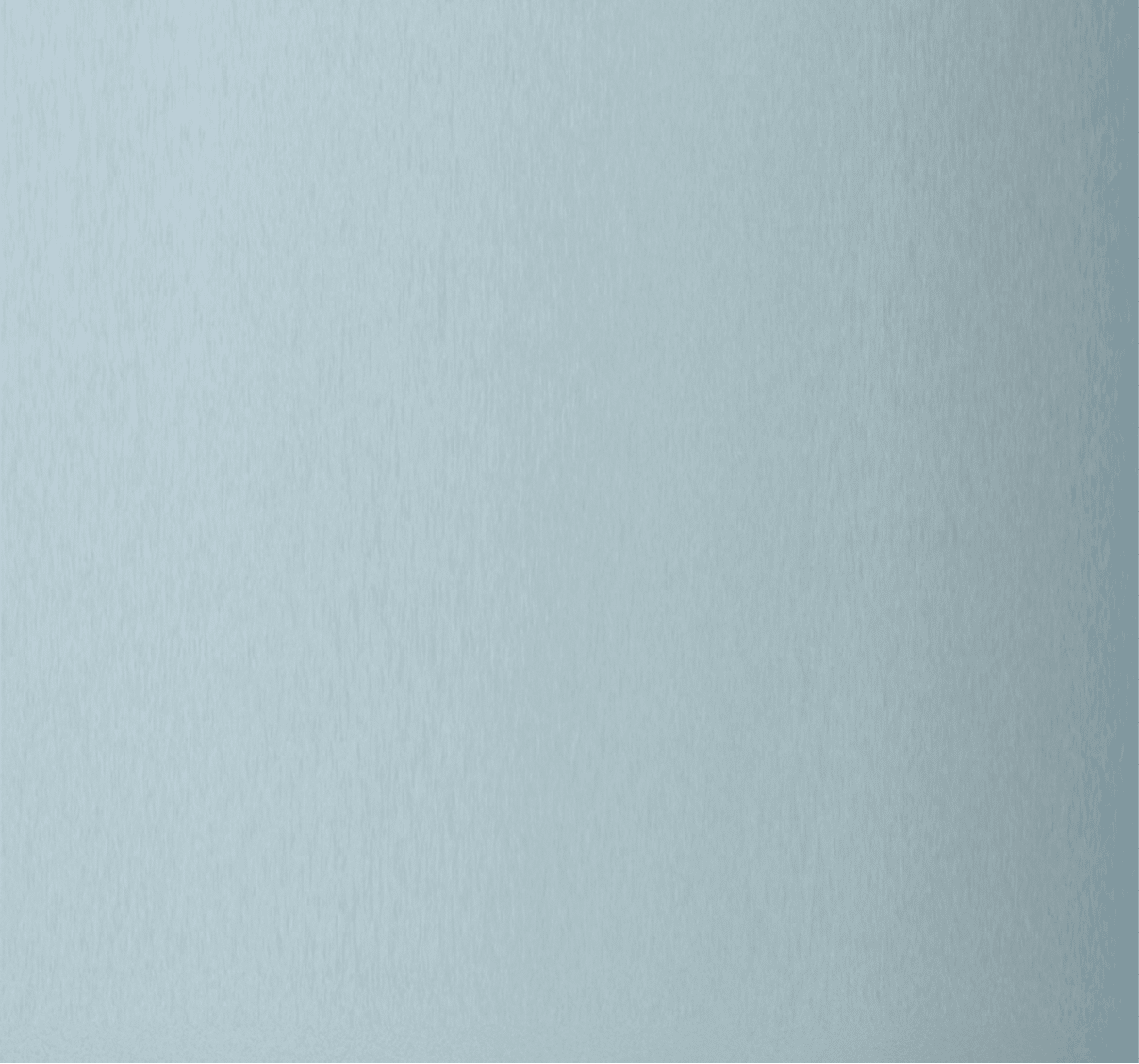 Construction workers at sunset.